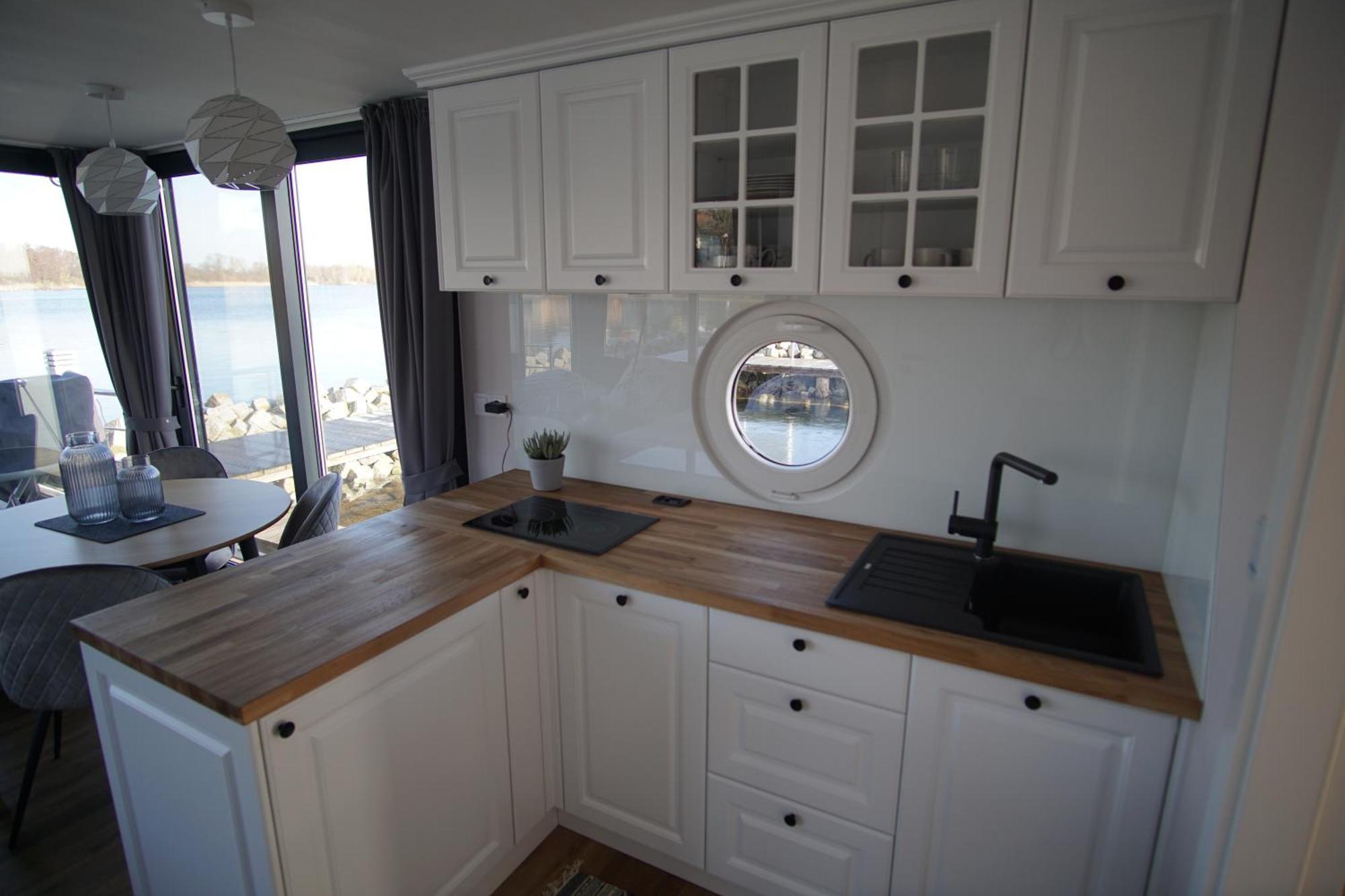Отель Modernes Festliegendes Hausboot Mit Grosszuegiger Dachterrasse Und Ruderboot Рёбель Экстерьер фото